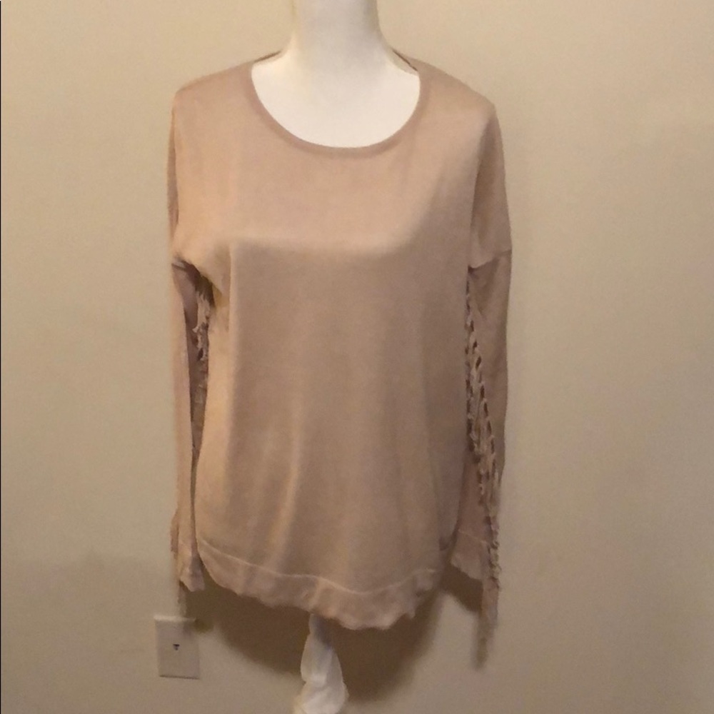 Beige sweater with fringe